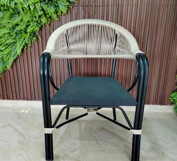 Luxury metal chair woven with ropes and featuring an imported mesh base.3